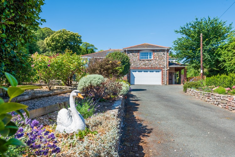 Welcome to Swan Haven-the ultimate family holiday home for 12-with games room, indoor pool, landscaped gardens and comfortable useful interiors